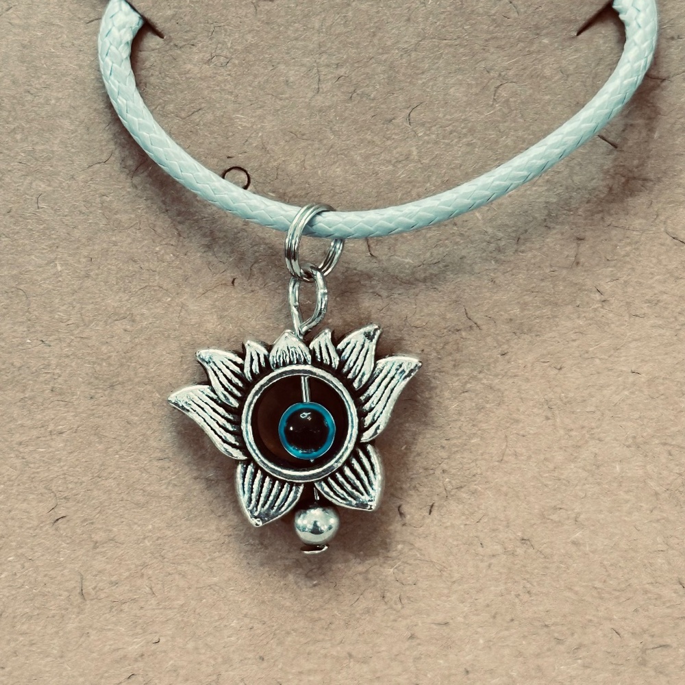 2/$20 Silver tone lotus flower evil eye charm Pendant only Chain not included